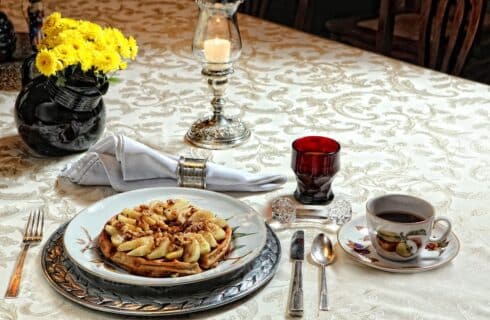 Waffles in the fall are served with baked apples, sausage, and walnuts in a brown sugar butter sauce! Fresh maple syrup on the side. Juice and coffee! The Queen, A Victorian Bed and Breakfast in Bellefonte, PA.
